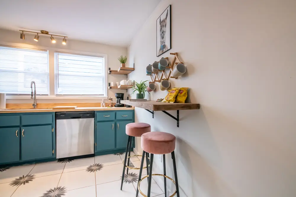 Unit B breakfast bar with pink stools